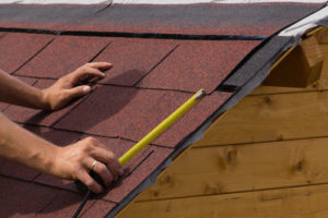 Construction of asphalt shingles on a roof of wood. estimating roof replacement waldorf maryland. Roofing company