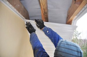 Contractor, Roofer Installing Soffit. Roofing Construction Southern Maryland